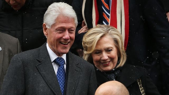 Former president Bill Clinton and his wife, former Secretary of State Hillary Clinton, leave St. Ignatius Loyola Church after the funeral of former three-term governor Mario Cuomo on January 6, 2015 in New York City.