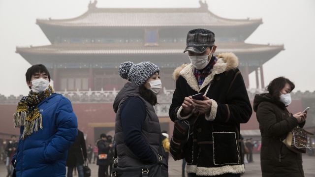 people wear masks to protect against smog