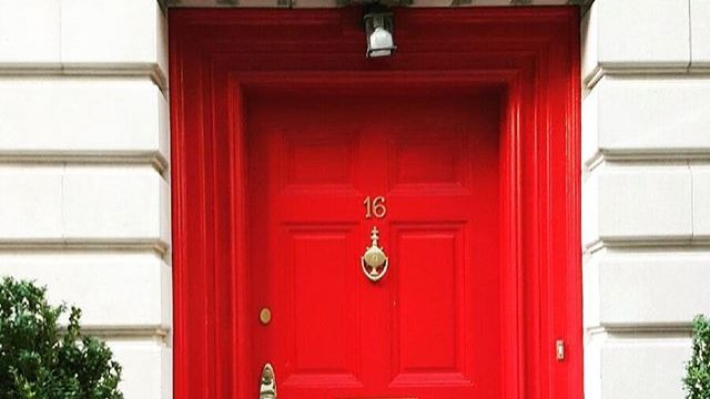 A red door, which asylum seekers say is marking them for discrimination.