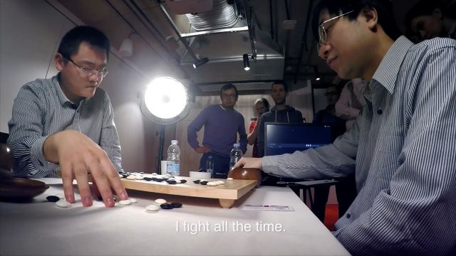 Go champion Fan Hui plays AlphaGo.