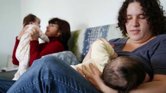 Israeli mothers are seen taking part in a breast-feeding course on November 12, 2003 Moshav Udim, central Israel.