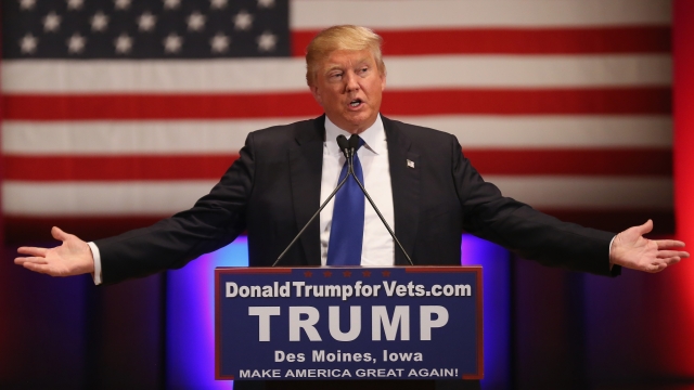 Republican presidential candidate Donald Trump gestures as he speaks to veterans at Drake University on January 28, 2016 in Des Moines, Iowa.