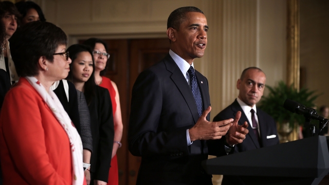 Obama signs fair pay act