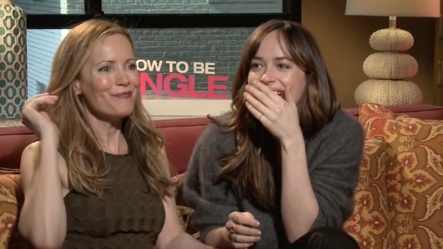 Actresses Dakota Johnson and Leslie Mann hit on reporter Chris Van Vliet during an interview promoting their film "How To Be Single."
