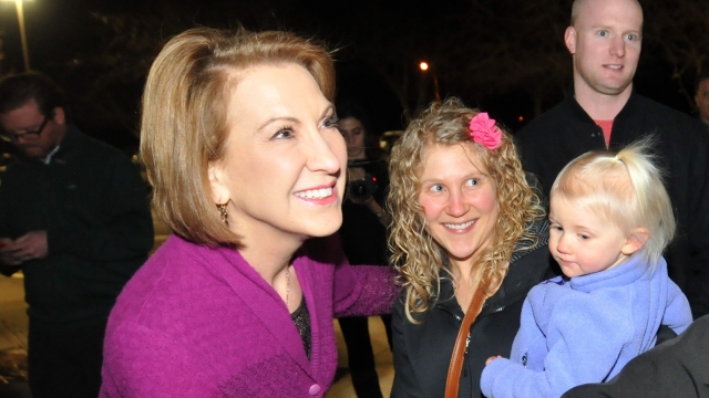 Republican presidential candidate Carly Fiorina greets attendees at a Republican caucus site February 1, 2016 in West Des Moines, Iowa. Democratic and Republican presidential candidates await the caucus returns from the first step in nominating a presidential candidate from each party.