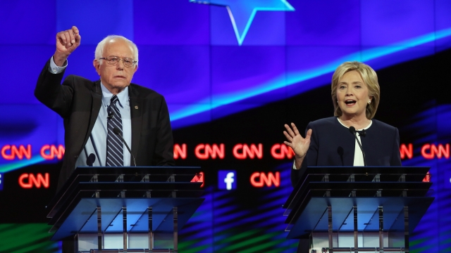 Democratic presidential candidates Sen. U.S. Bernie Sanders (I-VT) (L) and Hillary Clinton take part in a presidential debate sponsored by CNN and Facebook at Wynn Las Vegas on October 13, 2015 in Las Vegas, Nevada.