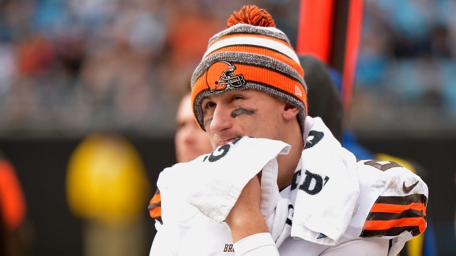 ohnny Manziel #2 of the Cleveland Browns watches from the bench during the second half of a loss to the Carolina Panthers at Bank of America Stadium on December 21, 2014 in Charlotte, North Carolina.