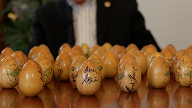Signed wooden eggs from Politics & Eggs speakers