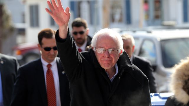 Democratic presidential candidate Senator Bernie Sanders (D-VT) walks through downtown Concord on election day on February 9, 2016 in Concord, New Hampshire.