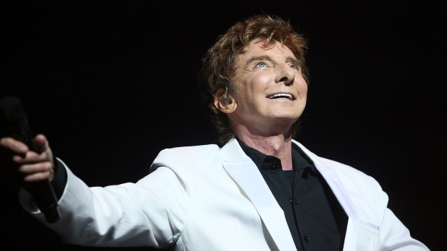 Singer Barry Manilow peforms during the curtain call of Manilow On Broadway Opening Night at the St. James Theatre on January 29, 2013 in New York City.