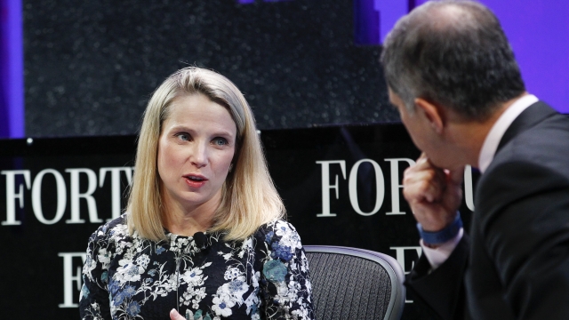 Marissa Mayer (L) and Adam Lashinsky speak on a panel during the Fortune Global Forum - Day2 at the Fairmont Hotel on November 3, 2015 in San Francisco, California.