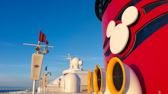 The Disney Wonder was traveling from Miami to the Cayman Islands when it stopped to pick up 12 suspected Cuban migrants on Saturday.