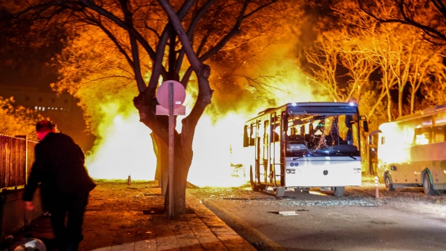 Turkish army service buses burn after an explosion.