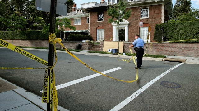 District of Columbia Metropolitan Police maintain a perimeter around the house on the 3200 block of Woodland Drive NW May 19, 2015 in Washington, DC.