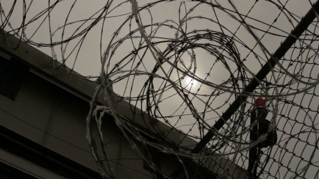 Barbed wire fence outside a prison.
