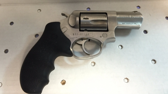 A gun containing spent casings found in the suspect's car.
