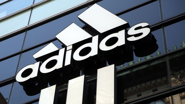 An Adidas store is viewed in Manhattan on July 31, 2014 in New York City. The German sporting goods manufacture surprised investors with a profit warning on Thursday that lowered its shares by as much as 16%.