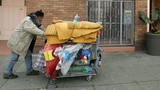 Joseph Cappa, a homeless person, pushes his shopping cart through a residential neighborhood February 28, 2007 in San Francisco, California.