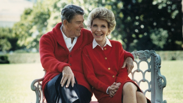 ormer U.S. President Ronald Reagan and First Lady Nancy Reagan share a moment in this undated file photo.