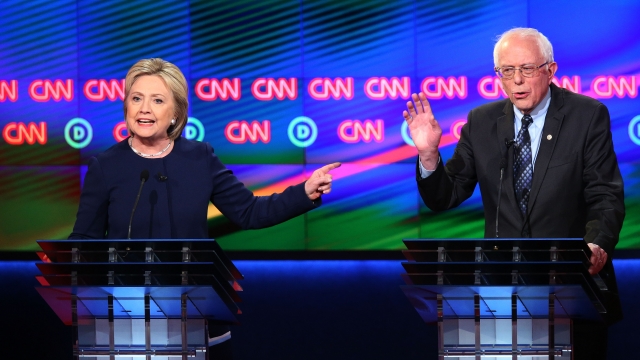 Hillary Clinton and Bernie Sanders spar during the Democratic debate Sunday