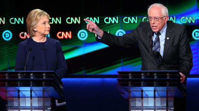 Democratic presidential candidates Senator Bernie Sanders and Hillary Clinton debate in Flint, Michigan.