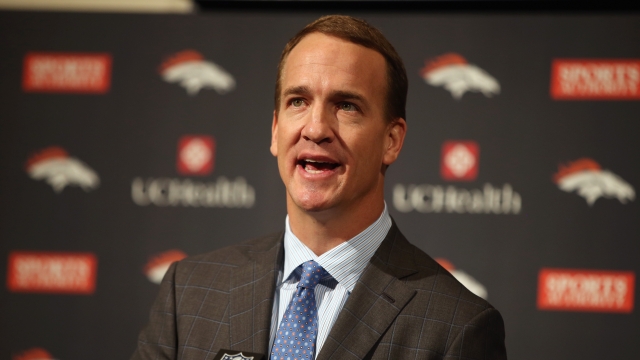 Quarterback Peyton Manning addresses the media as he announces his retirement from the NFL at the UCHealth Training Center on