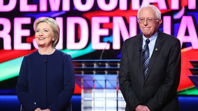 Clinton and Sanders before CNN debate in Flint, Michigan.