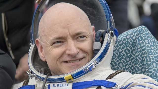 Astronaut Scott Kelly after returning to Earth is still in his spacesuit.