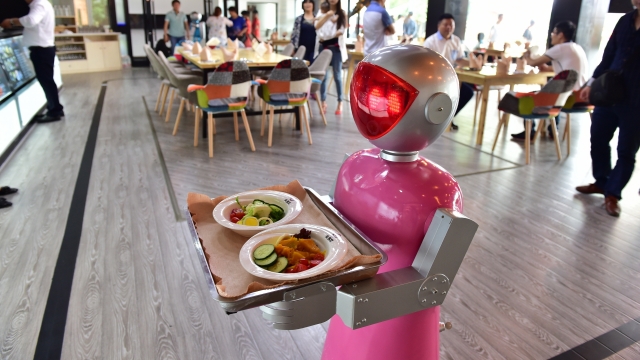 A robot serves food at a Chinese restaurant