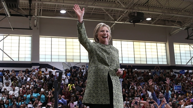 Hillary Clinton waves at a campaign rally in March.