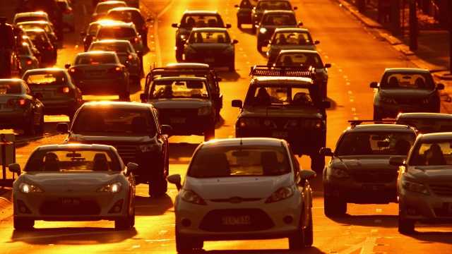 Rush hour traffic on a congested road as the sun sets on May 13, 2014 in Melbourne, Australia.