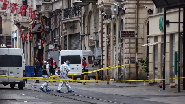 Emergency services cordon off street in Istanbul after an explosion.