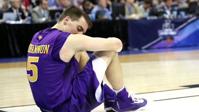 Matt Bohannon #5 of the Northern Iowa Panthers sits on the court after a play in the second half against the Texas A&M Aggies