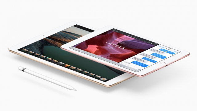 Apple's new 9.7-inch iPad Pro is pictured above its larger, 12.9-inch model.