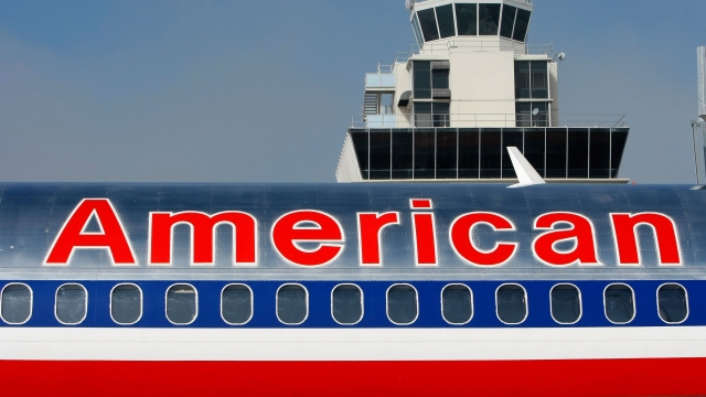 An American Airlines plane parks at the terminal after arriving at the Oakland International Airport in 2007.