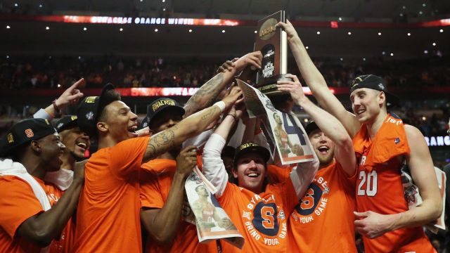 The Syracuse Orange celebrate their 68-62 win over the Virginia Cavaliers during the 2016 NCAA Men's Basketball Tournament