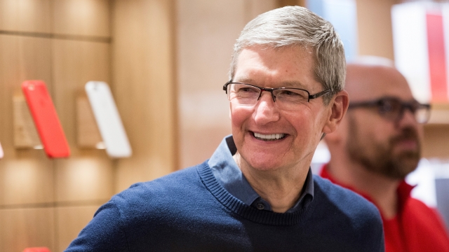 Tim Cook, CEO of Apple, visits an Apple store.