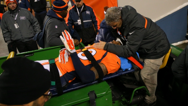 David Bruton of the Denver Broncos is carted off the field after suffering a reported concussion