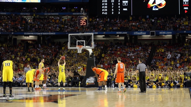 Spike Albrecht of Michigan shoots a free throw during the 2013 Final Four at the Georgia Dome in Atlanta.
