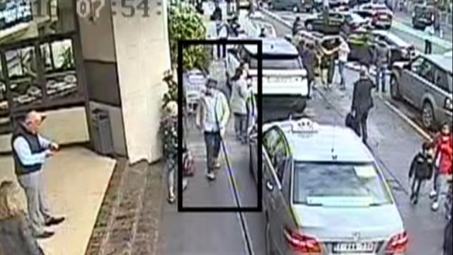 Brussels airport bombing suspect shown in surveillance footage.