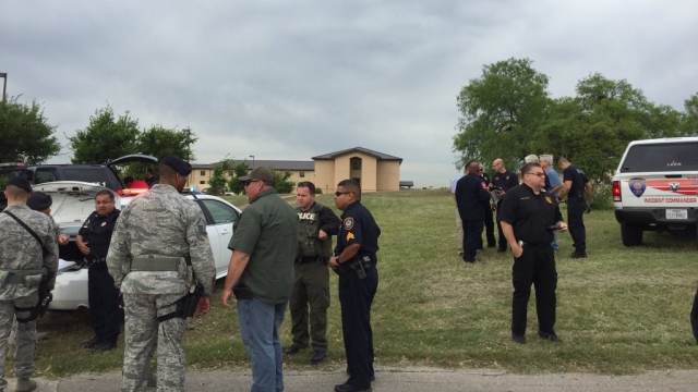 Photo of police officers on the scene of a shooting at Lackland Air Force Base.