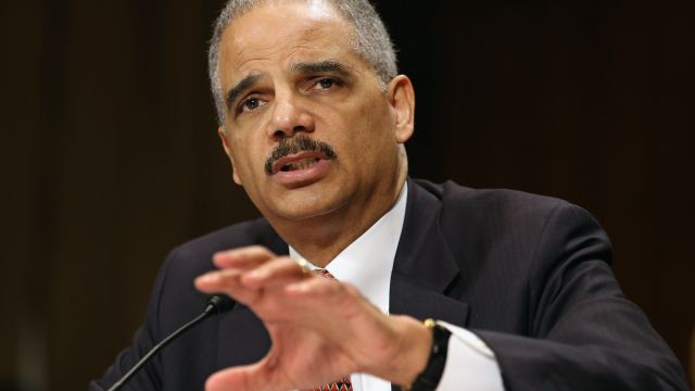 Former Attorney General Eric Holder testifies on Capitol Hill.