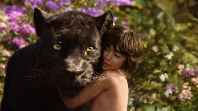 Mowgli hugs Bagheera.