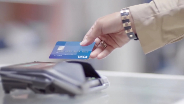 Photo of a Visa chip-enababled credit card.