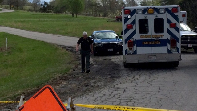 Photo of medical vehicles and police after reports of a shooting in southern Ohio.