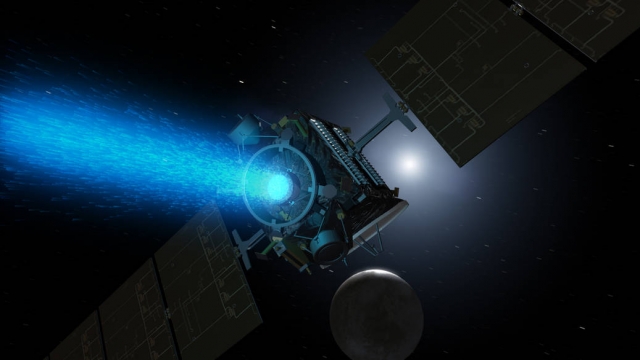 A digital rendering of NASA's Dawn spacecraft, with ion trail visible.