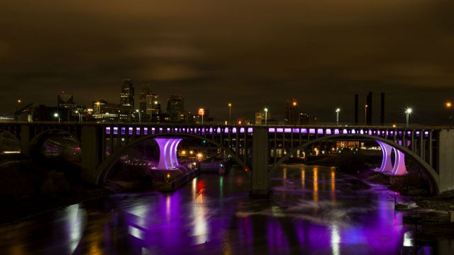 The I-35W bridge lit up purple to honor Prince after he died on April 21, 2016.