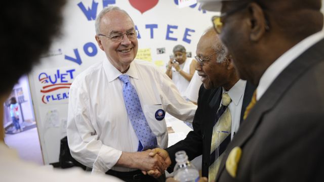 Former U.S. Sen. Harris Wofford greets campaign volunteers for Barack Obama in 2008.