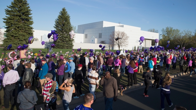 Prince's fans pay tribute to the singer at his Paisley Park estate.