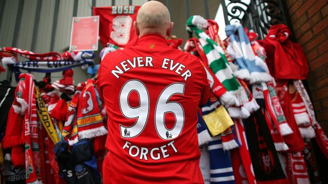 Liverpool fans pay their respects at the Hillsborough memorial at Anfield on April 15, 2009, Liverpool, England.